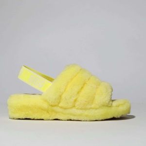 Yellow comfy ugg slides